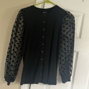 Fun button led cardigan with see through polka dot sleeves!